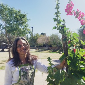 JoAnn Sanchez in SCNM herb garden